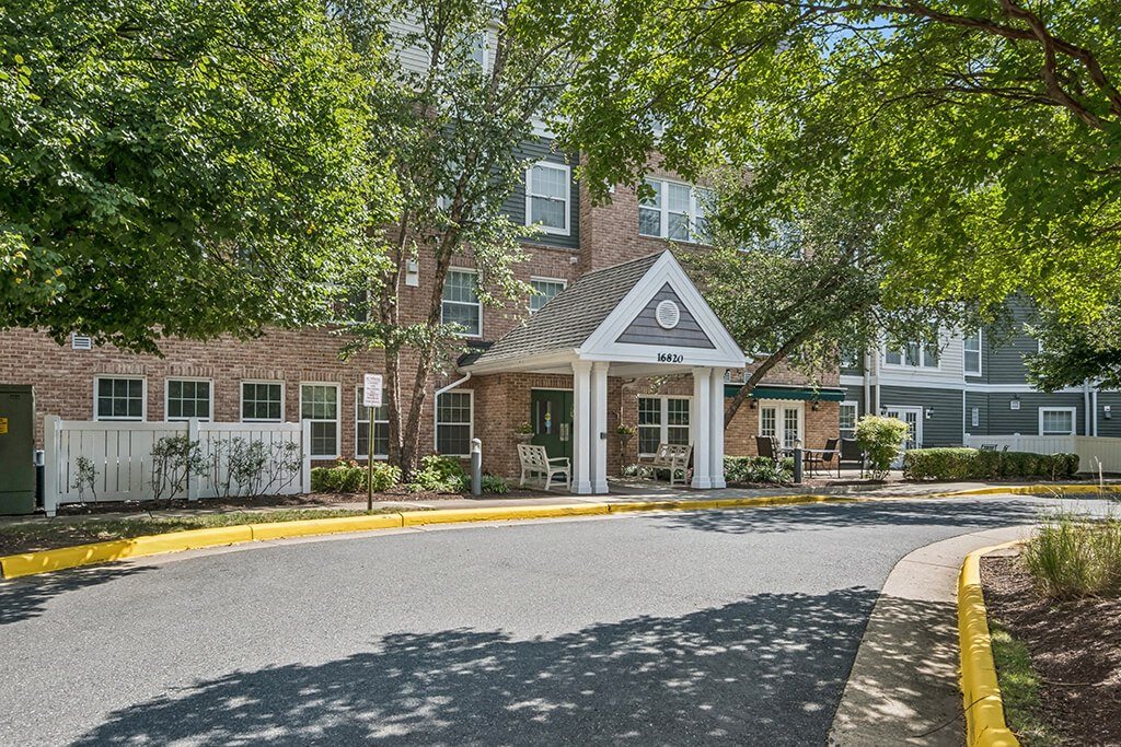 Leasing center exterior at The Woods at Victoria Park Apartments in Woodbridge VA